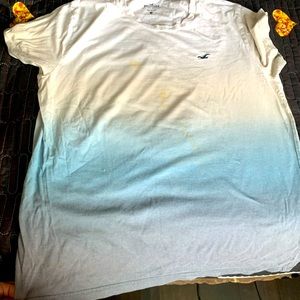 Two Hollister shirts size s the blue one has a yellow stain